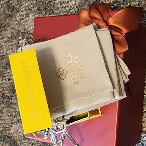 Kendra Scott yellow box and pouches
